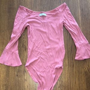 Pink ribbed off the shoulder bodysuit